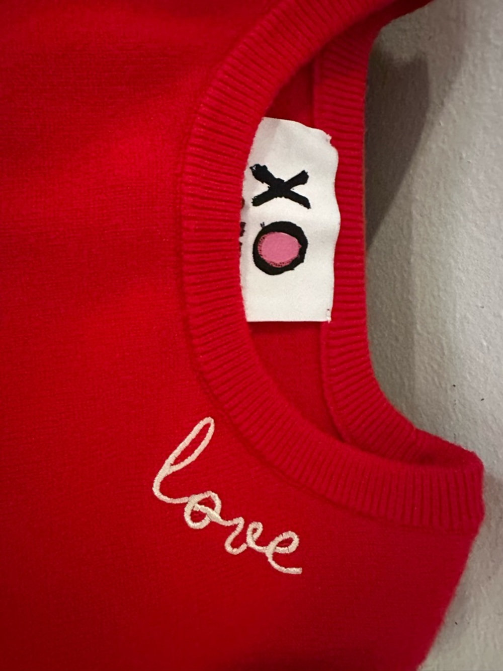 XOXO Red Sweater with Pink Heart Elbow Patches and “LOVE” stitching at collar.